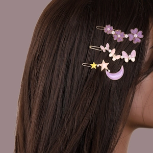 Three-piece Korean style flower and butterfly hair clip set on long brown hair