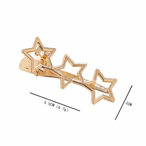 Golden hollow Y2K star hair clip with three pentagrams on a clean white background