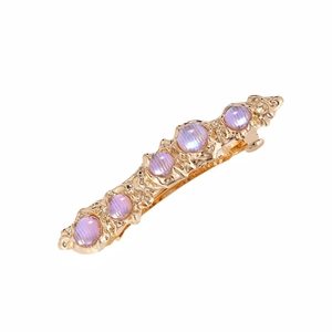 Barrette dorée rétro avec gravures baroques et cinq pierres de lune violettes serties