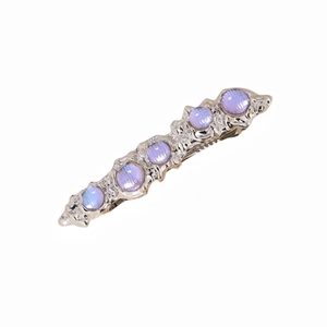 Barrette rétro argentée avec cinq pierres rondes violettes irisées sur base martelée