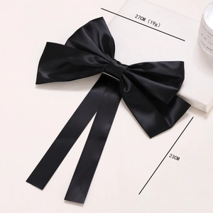 Large black satin silk bow hair clip with long ribbons for elegant women hairstyle