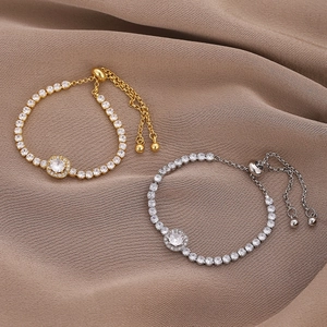 Adjustable square zircon bracelet in gold and silver finish on elegant brown fabric