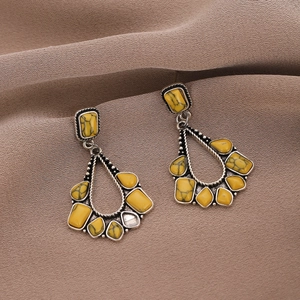 Vintage silver drop earrings with yellow turquoise in a bohemian teardrop design