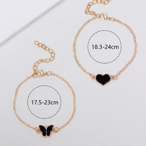 Goldenes Armband-Set mit schwarzem Emaille-Schmetterling und Herz, verstellbar