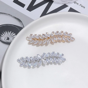 Elegante blattförmige Haarklammern aus Kristall mit Zirkonsteinen in Gold und Silber