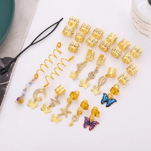 Gold African hair braid rings set with butterfly and star charms for DIY hair styling