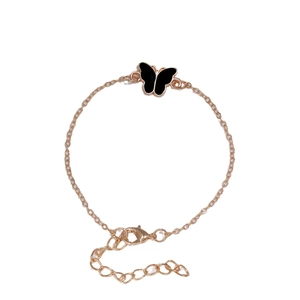 Elegantes Gold-Schmetterling-Armband mit schwarzen Emaille-Anhängern und verstellbarer Kette