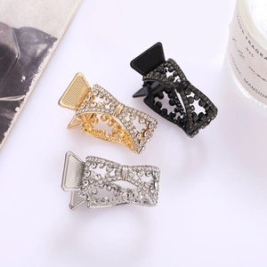 Three-piece rhinestone bow hair claw clips in gold silver and black metal finishes