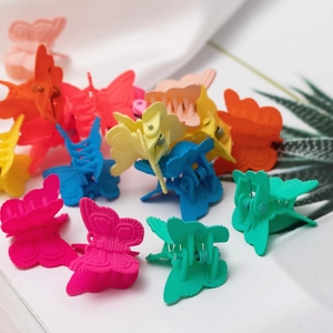 Set di mini fermagli per capelli a farfalla opachi e colorati per bambine
