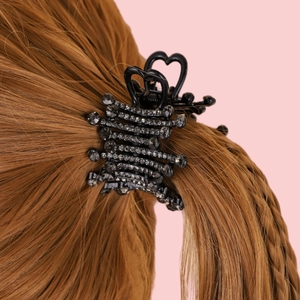 Sparkling rhinestone heart hair claw clip for high ponytail styling on brunette hair
