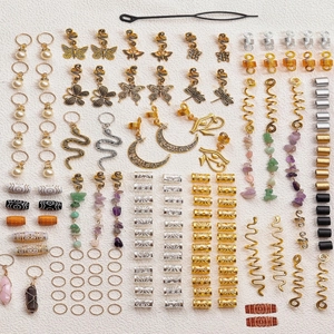 Detailed overhead view of 146pcs dreadlock accessories set with natural stones and charms