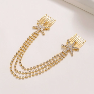 Detail of gold star-shaped hair combs with three layered rhinestone fringe chains