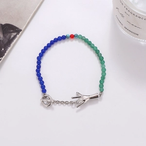 Emerald glass bead bracelet with blue accents and silver I Love You gesture charm