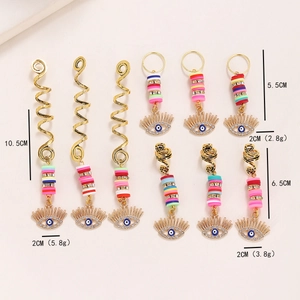 Golden snake hair rings with blue evil eye pendants for bohemian braid styling