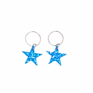 Detail of blue glitter star hair ring charm with silver metallic loop accessory