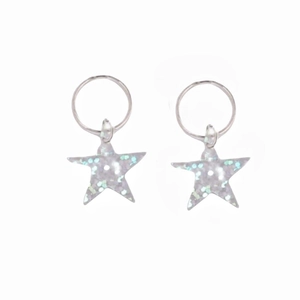 Detailed close-up of Y2K style star-shaped pendants with silver glitter for hair rings