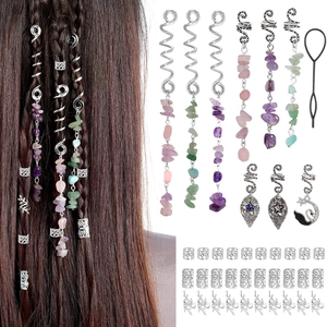 Detail of bohemian dreadlock hair rings with natural stone charms and silver spirals