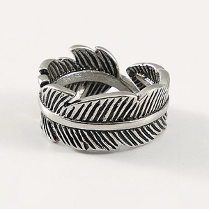 Detail of vintage feather ring showing detailed texture and oxidised silver finish