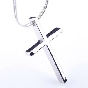 Polished silver cross pendant on snake chain with highly reflective mirror finish