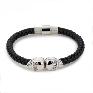Men's punk skull braided leather bracelet with silver stainless steel clasp on white background