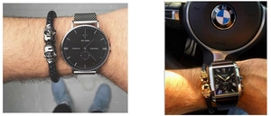 Men's leather bracelet with silver and gold skull charms paired with luxury watches