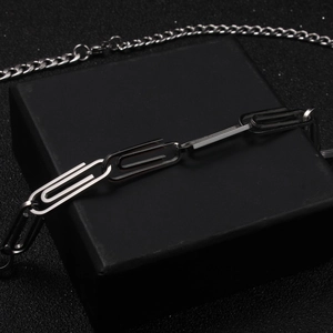 Modern minimalist stainless steel paperclip link chain necklace on black display box