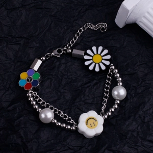 Détails du bracelet en perles avec pendentifs de tournesol et fleur signe de paix