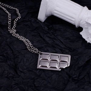 Edgy hip-hop style titanium steel necklace with a creative bitten chocolate bar pendant
