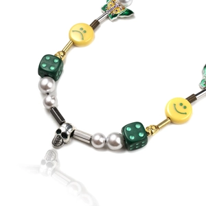 Hip hop beaded necklace with green dice, yellow smile face, and silver skull pendant