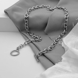 Detail of silver titanium steel chunky link necklace with a classic OT toggle clasp