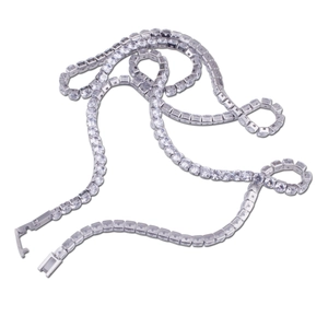 Close-up of hip hop tennis necklace featuring silver-plated links and cubic zirconia stones