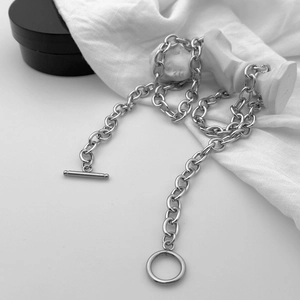 Detailed view of silver titanium steel chain necklace with industrial OT toggle clasp