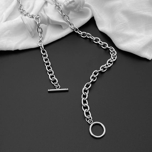 Macro shot of polished silver stainless steel chunky chain necklace with OT toggle clasp