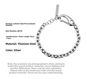 Detail view of silver titanium steel Cuban link bracelet with lobster clasp and extension