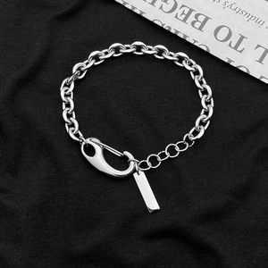 Industrial style silver stainless steel Cuban link bracelet with large lobster clasp and tag