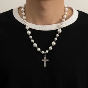 Hip hop pearl necklace for men and women featuring a rhinestone-encrusted silver cross pendant