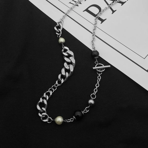 Close-up of titanium steel Cuban chain with mixed pearls and sparkling crystal details
