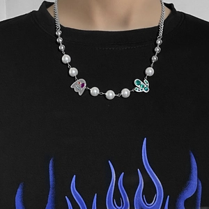 Fashionable pearl and titanium steel necklace with ghost and green crystal pendants