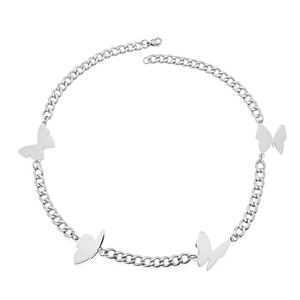 Silver curb chain necklace featuring four butterfly silhouettes in a minimalist design