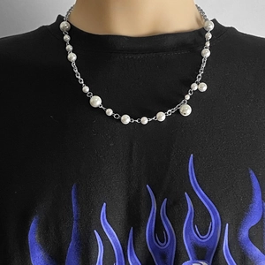 Hip hop style asymmetric necklace featuring silver chain and white glass pearls