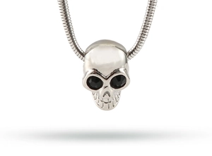 Close-up of vintage skull pendant necklace with black rhinestone eyes on silver snake chain