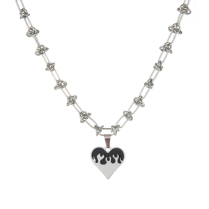 Silver stainless steel heart flame pendant necklace with unique link chain on white background