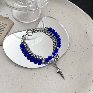 Double-layer stainless steel bracelet with blue cat eye beads and star pendant