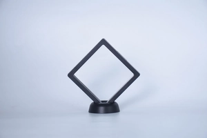 Minimalist black square PE film jewelry display box with round base for floating storage
