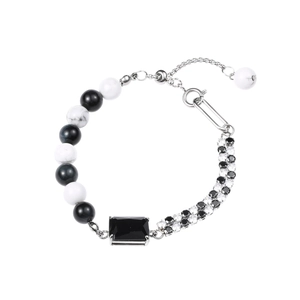 Modern black and white beaded bracelet with marble beads and rectangular black gemstone