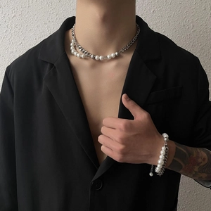 Dual-layer Cuban chain and pearl necklace set shown on black suit jacket for unisex fashion