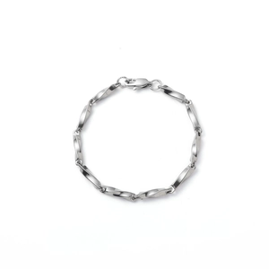 Detail of silver titanium steel chain with twisted rectangular links and lobster clasp
