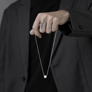 Unisex minimalist titanium steel necklace featuring a square cube pendant on an O-chain