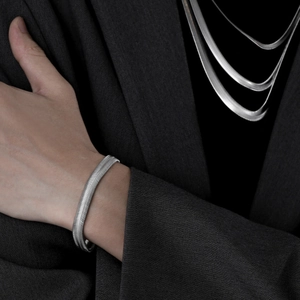 Minimalist silver wide snake bone chain necklace and bracelet set for a sleek hip-hop look