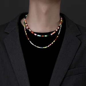 Colorful beaded layered necklace with rainbow beads for men and women on model